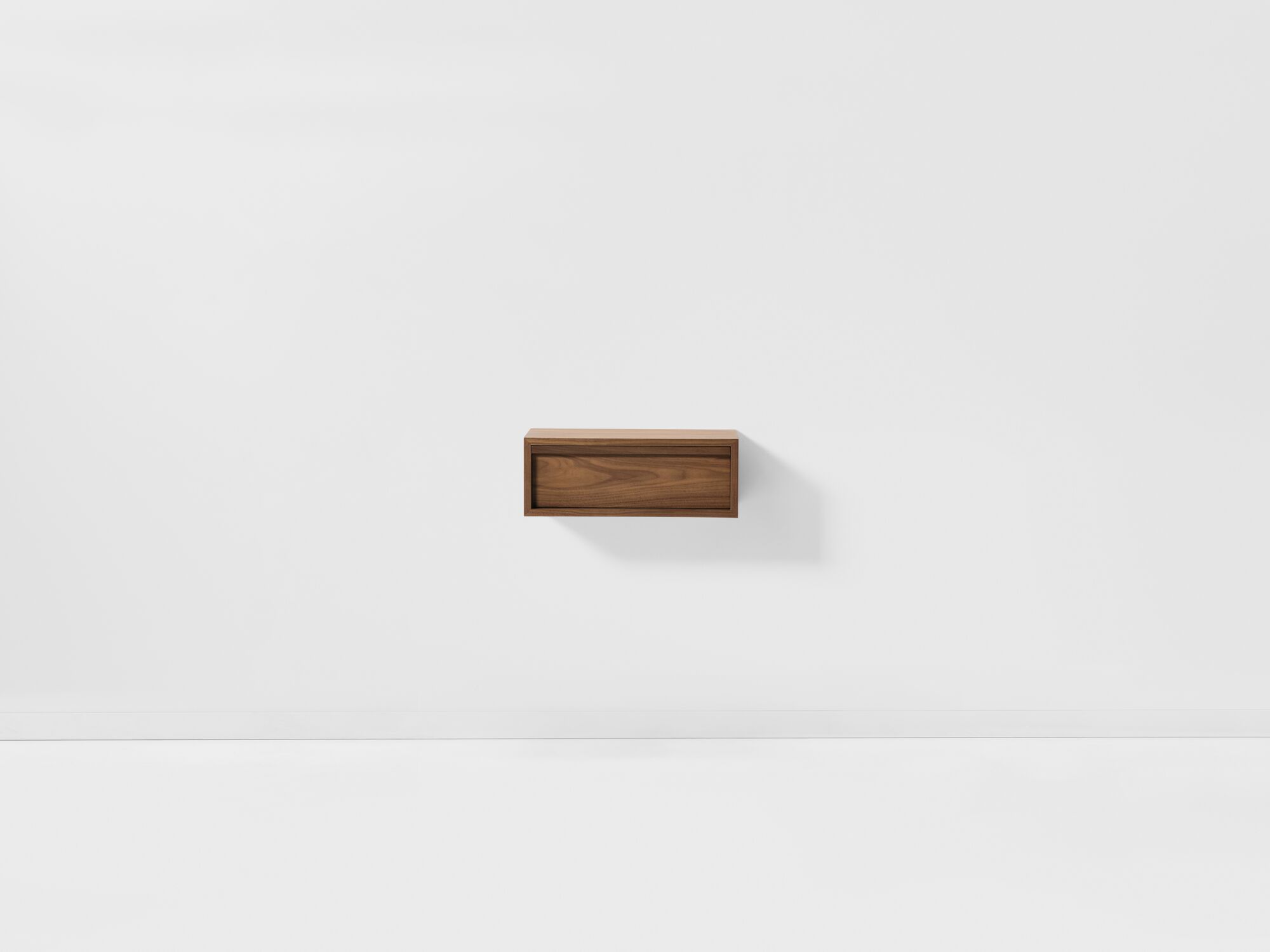 Front view of modern walnut floating nightstand